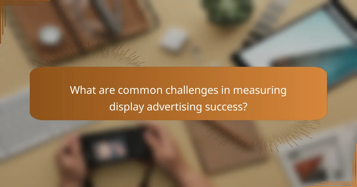 What are common challenges in measuring display advertising success?